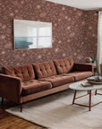 Habita wallpaper design - rust Maude floral pattern in living room
